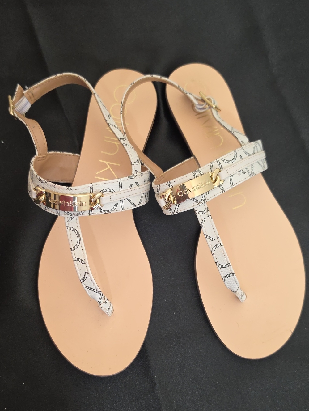 Calvin Klein White Logo-Print T-Strap Sandals with Gold Accents